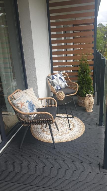 Balkón alebo terasa v ubytovaní Apartament ROYAL Mielno Sosnowa 4