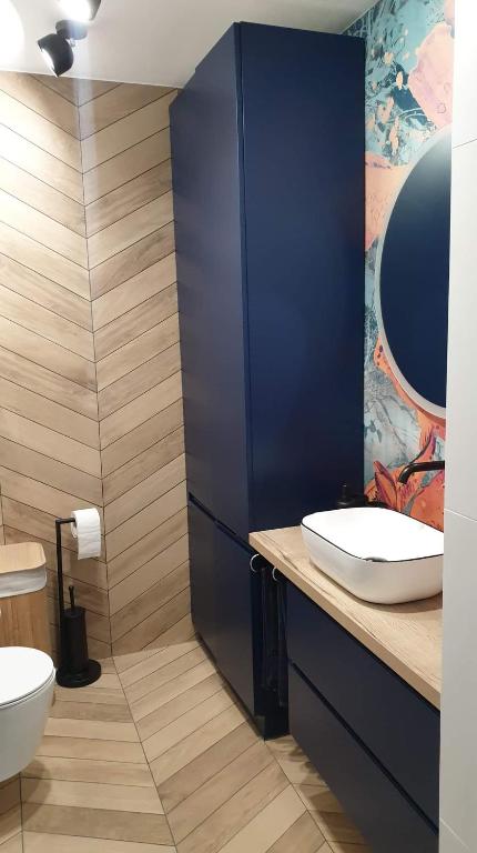Kúpeľňa v ubytovaní Apartament ROYAL Mielno Sosnowa 4