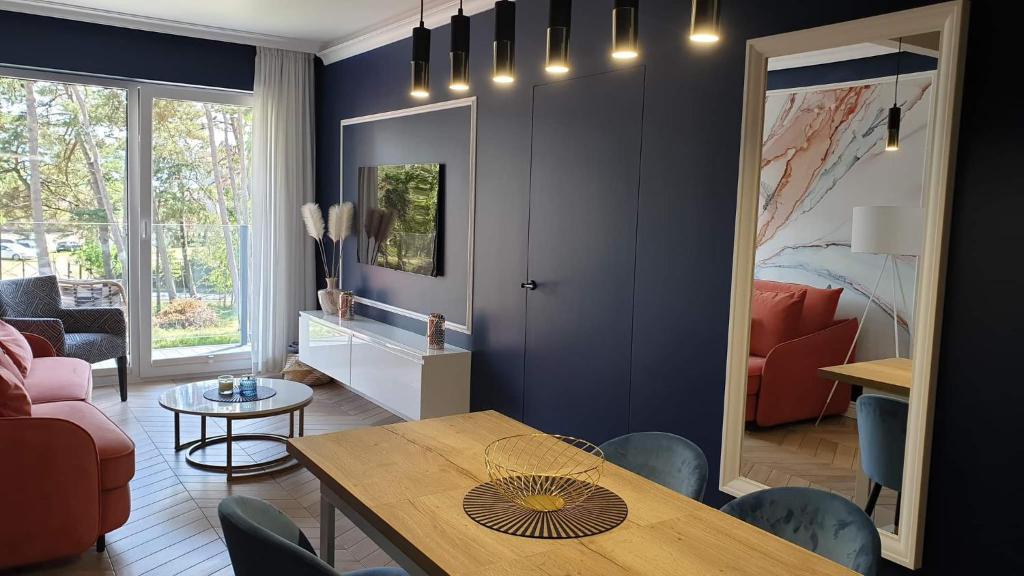 Posedenie v ubytovaní Apartament ROYAL Mielno Sosnowa 4