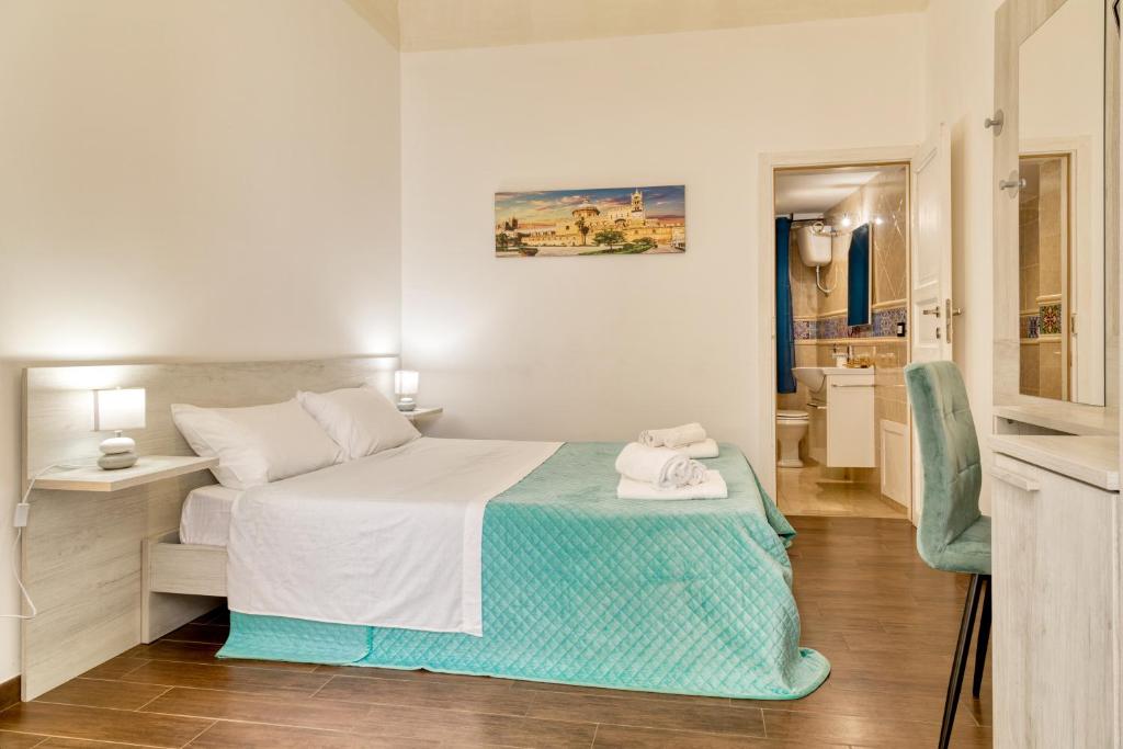 Posteľ alebo postele v izbe v ubytovaní Pupi 93 Rooms