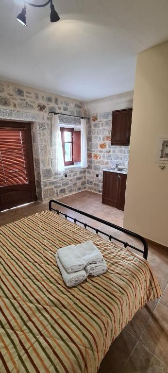 Postel nebo postele na pokoji v ubytování Althea Village