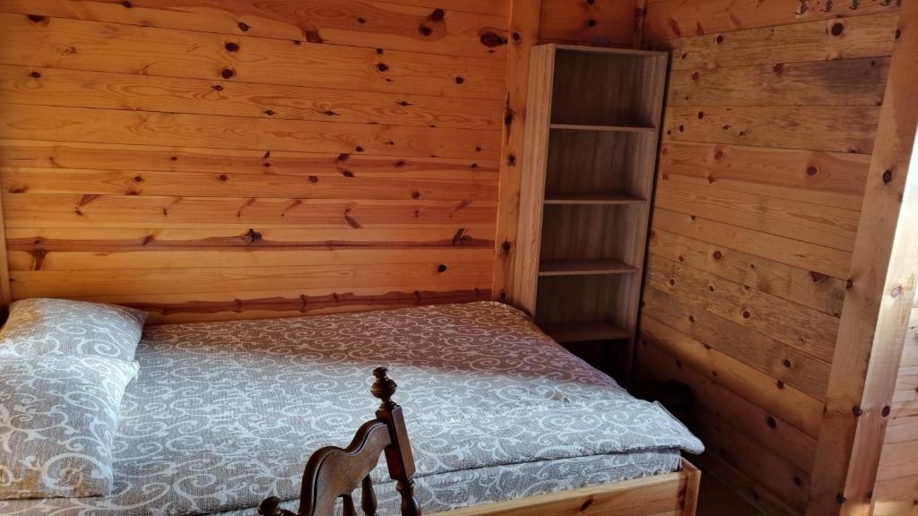 Postel nebo postele na pokoji v ubytování Kod Elka