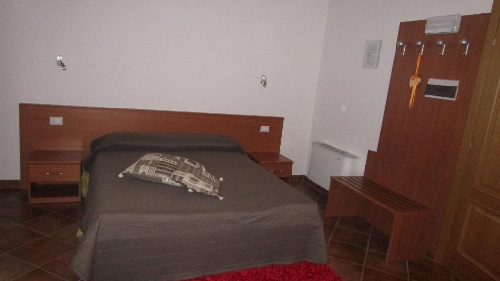 Postel nebo postele na pokoji v ubytování Al Castello
