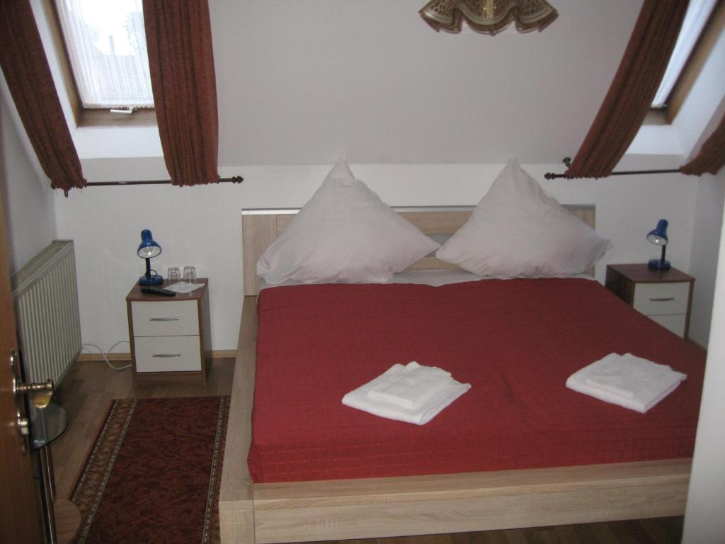 Een bed of bedden in een kamer bij Syrtaki bei Nikos