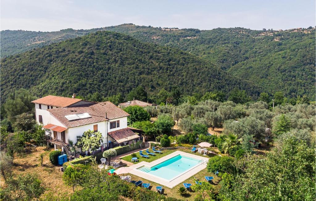 an aerial view of a house with a swimming pool at Almachiara in Sessa Cilento