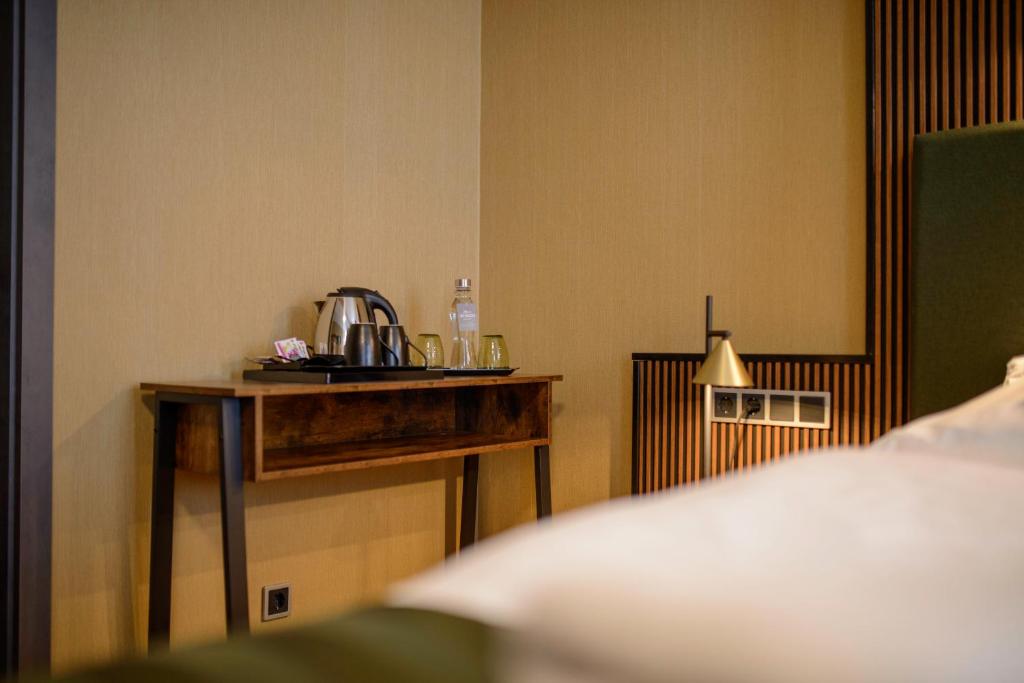 Postel nebo postele na pokoji v ubytování Stadthotel König Albert