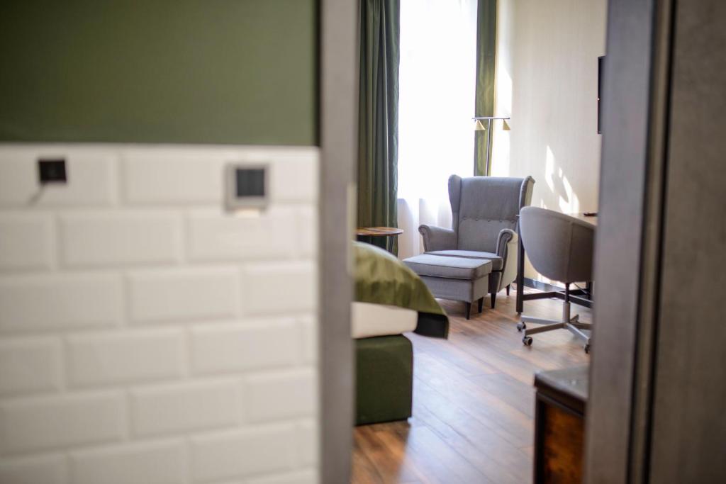 Posezení v ubytování Stadthotel König Albert