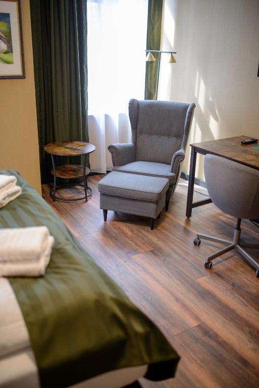 Posezení v ubytování Stadthotel König Albert