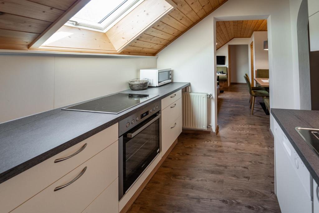 Kuchyň nebo kuchyňský kout v ubytování Landhotel - Apartments Bauer