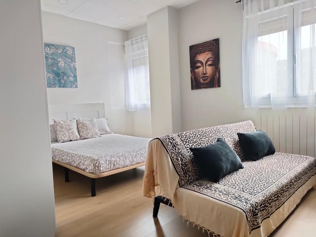 Apartamento coqueto ideal parejas tesisinde bir odada yatak veya yataklar