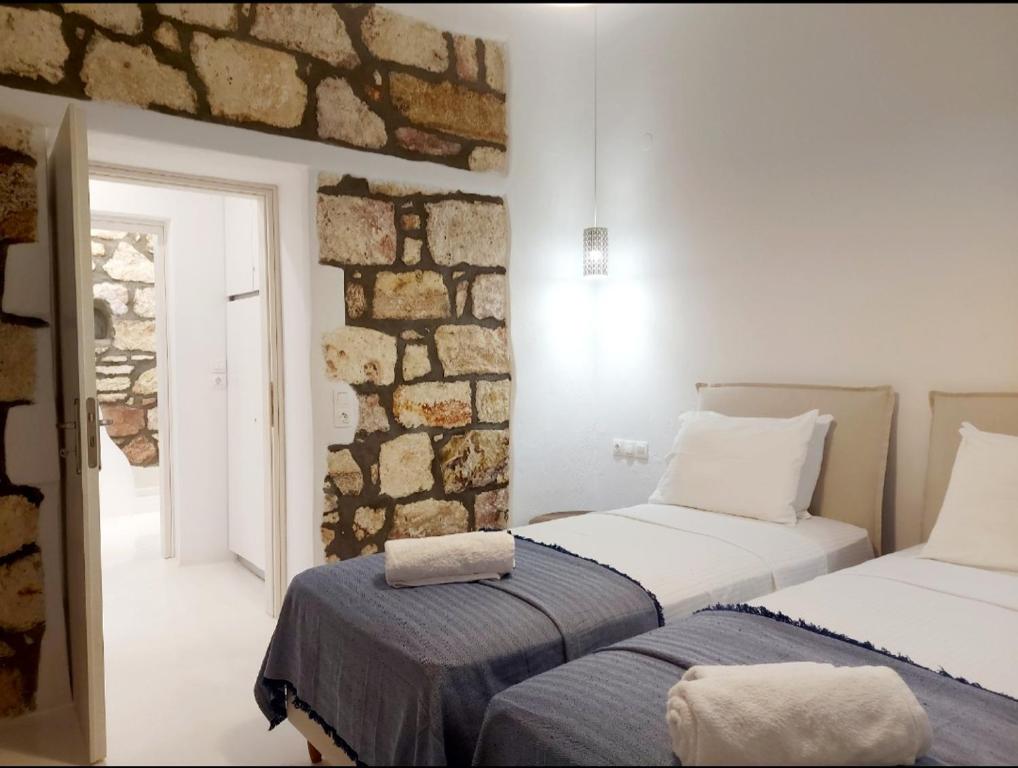 Postel nebo postele na pokoji v ubytování Villa DORIANA IN PELEKOUDA