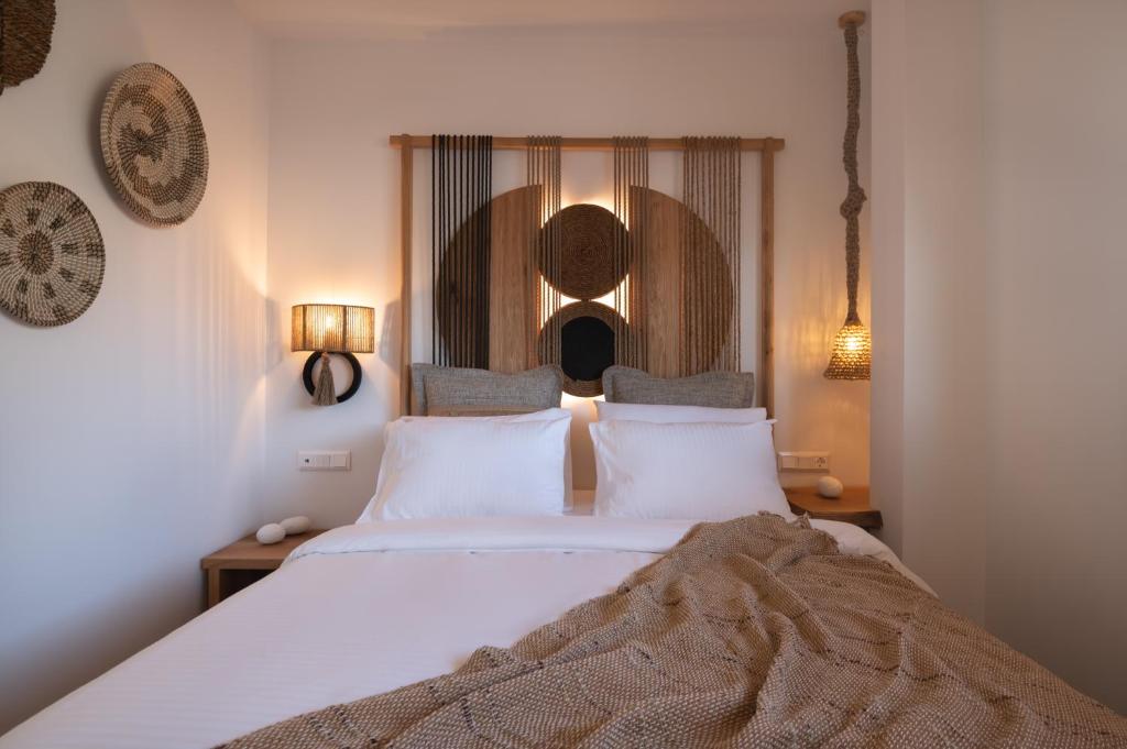 A bed or beds in a room at Apollonos at Heart of Plaka