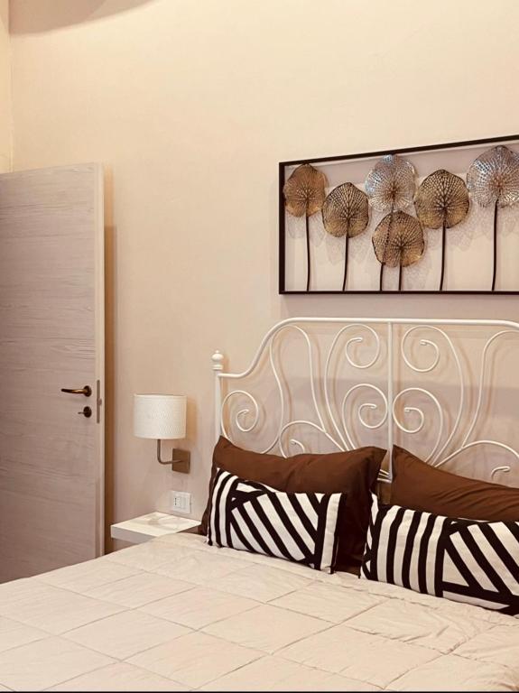 Postel nebo postele na pokoji v ubytování B&B Meliora Rooms