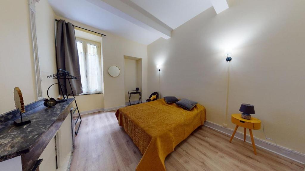Posteľ alebo postele v izbe v ubytovaní Le Casimir - Appartement de standing 90m2 - Carcassonne centre