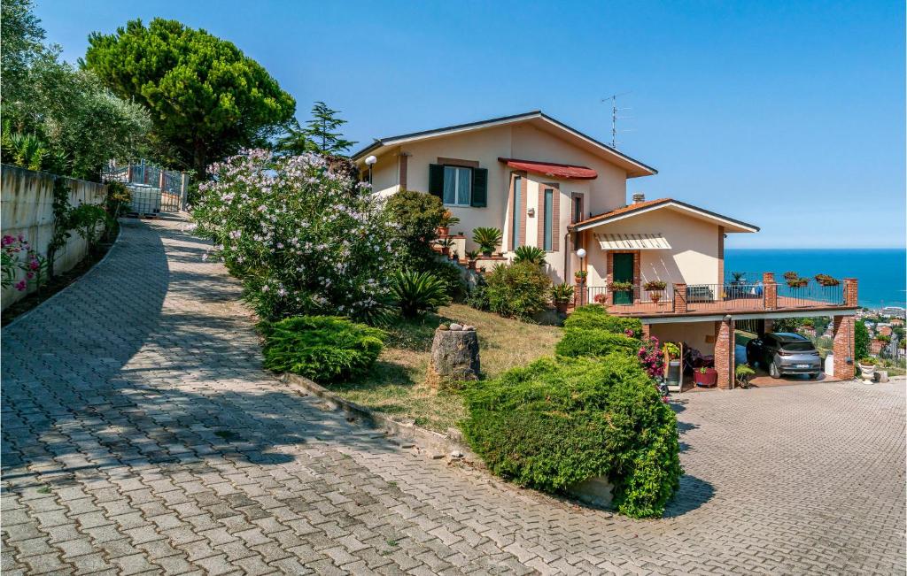 a house on a hill next to the ocean at Nice Home In Belsito With Wifi in Montepagano