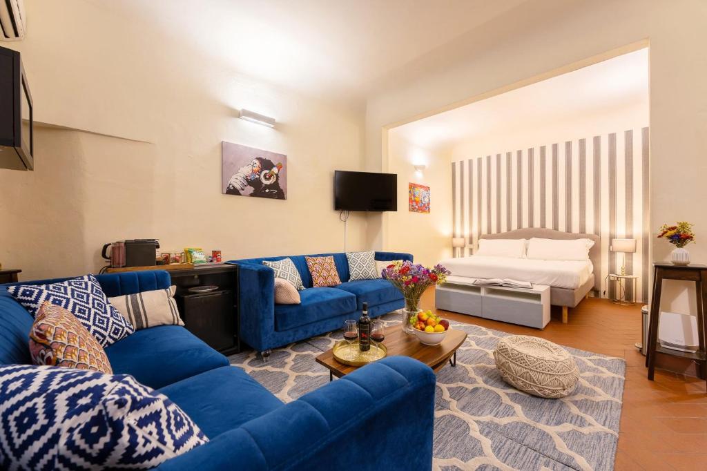 TV a/nebo společenská místnost v ubytování SPIRIT OF FLORENCE Boutique Rooms