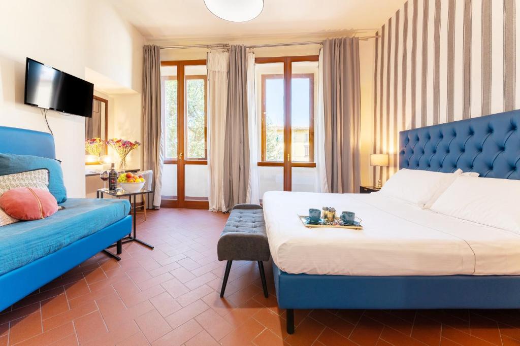 Postel nebo postele na pokoji v ubytování SPIRIT OF FLORENCE Boutique Rooms