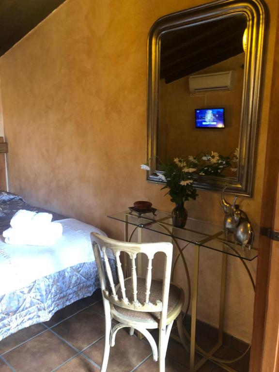 TV a/nebo společenská místnost v ubytování Finca Vergel