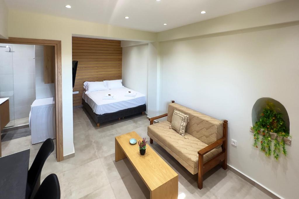A bed or beds in a room at Thea Studio