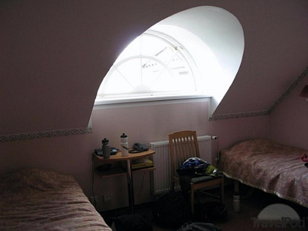 Voodi või voodid majutusasutuse Hotell De Tolly toas