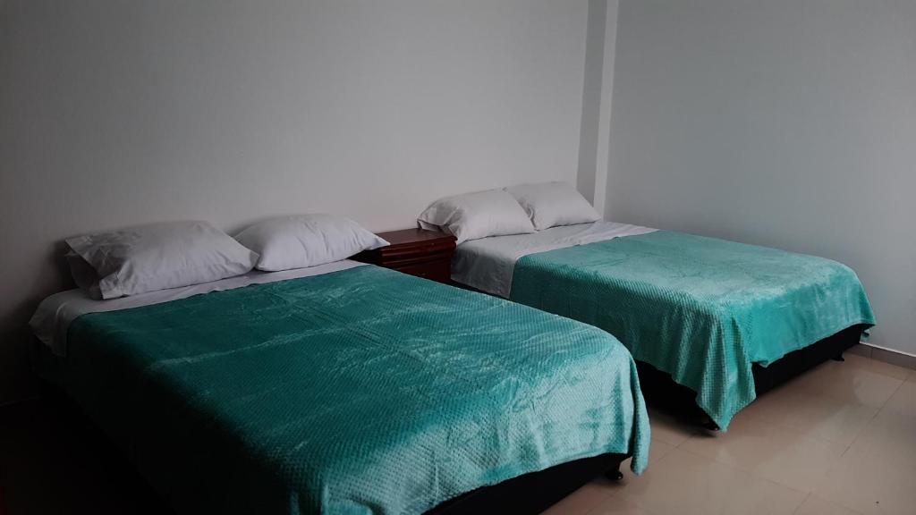 Postel nebo postele na pokoji v ubytování Apartamentos Turisticos EL ZIPA