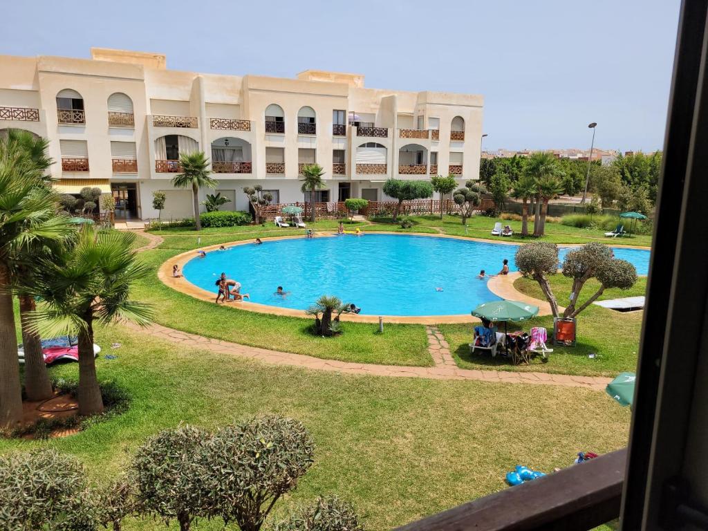 Bazén v ubytování Appartement avec piscine à saidia Climatisation et Wifi nebo v jeho okolí