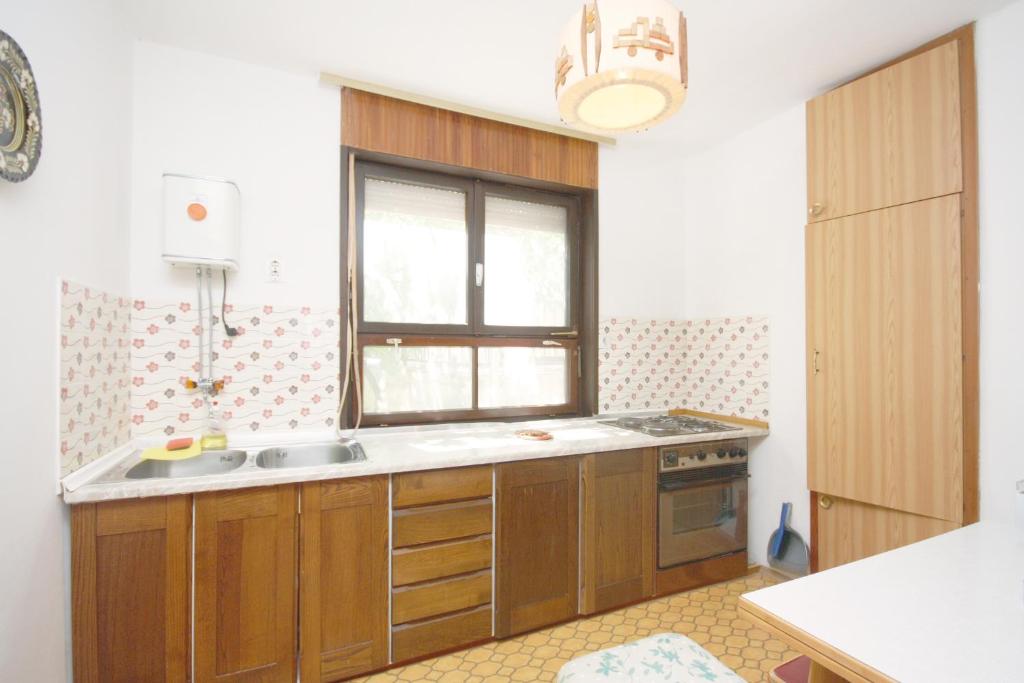 Fotografia z galérie ubytovania Apartments with a parking space Murter - 5103 v Betine