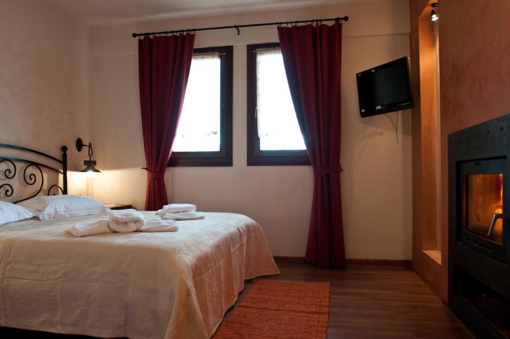 Posteľ alebo postele v izbe v ubytovaní Belina Hotel