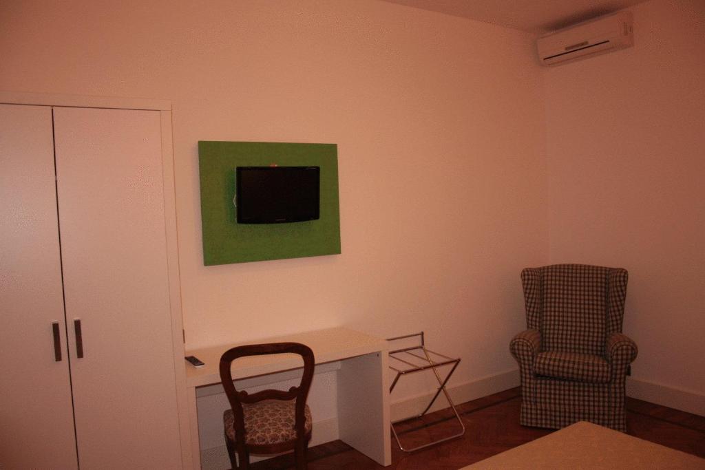 TV a/nebo společenská místnost v ubytování Hotel Da Cesare