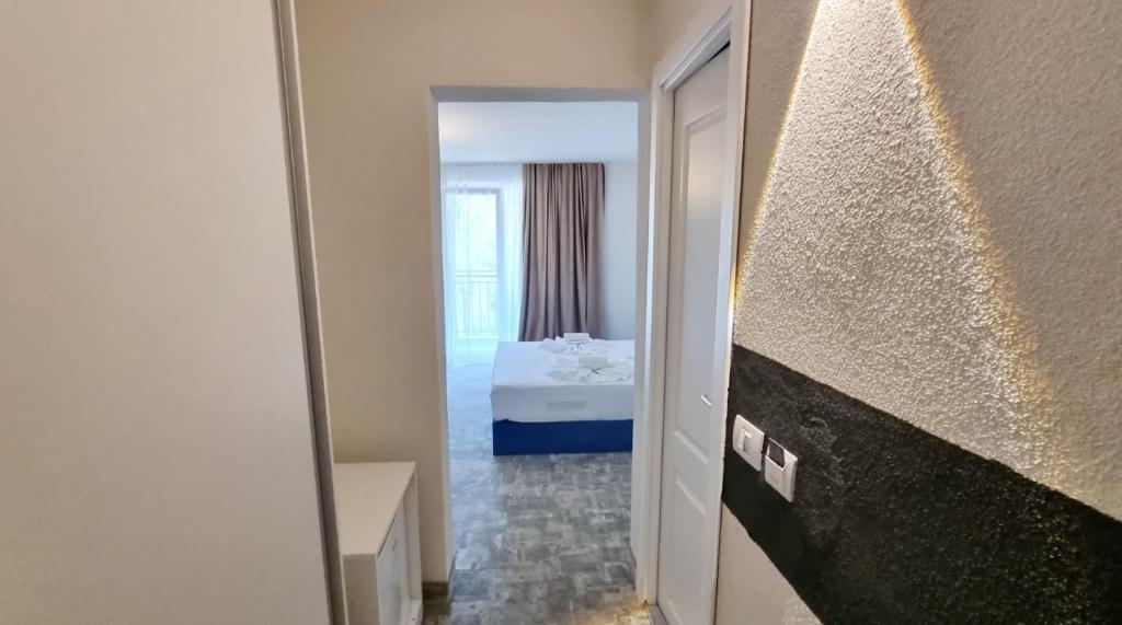 Postel nebo postele na pokoji v ubytování Mojo Resort