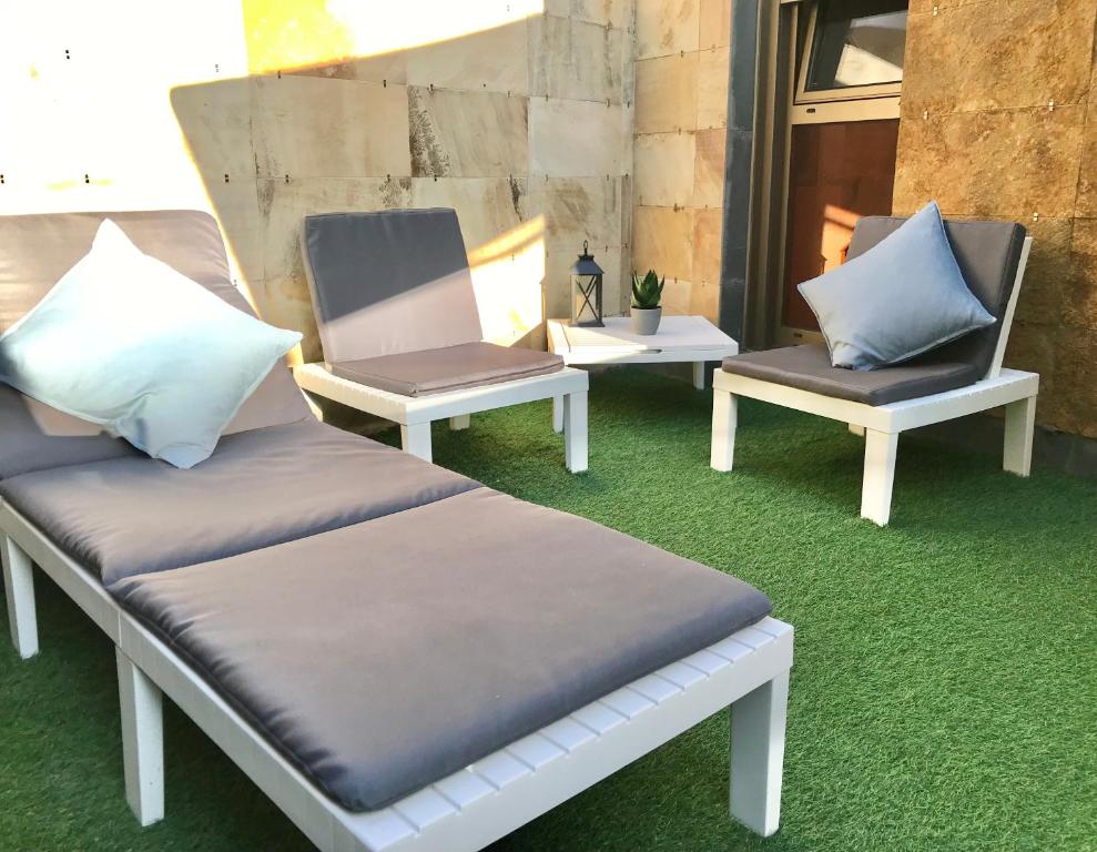 A seating area at Apartamento La Buena Vida