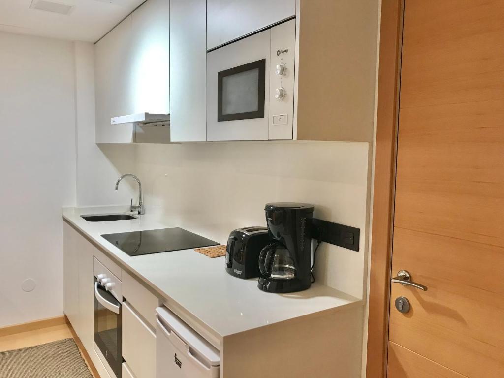 A kitchen or kitchenette at Apartamento La Buena Vida