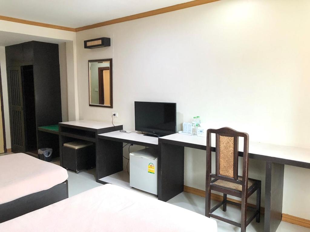 TV a/nebo společenská místnost v ubytování Visanuinn Hotel