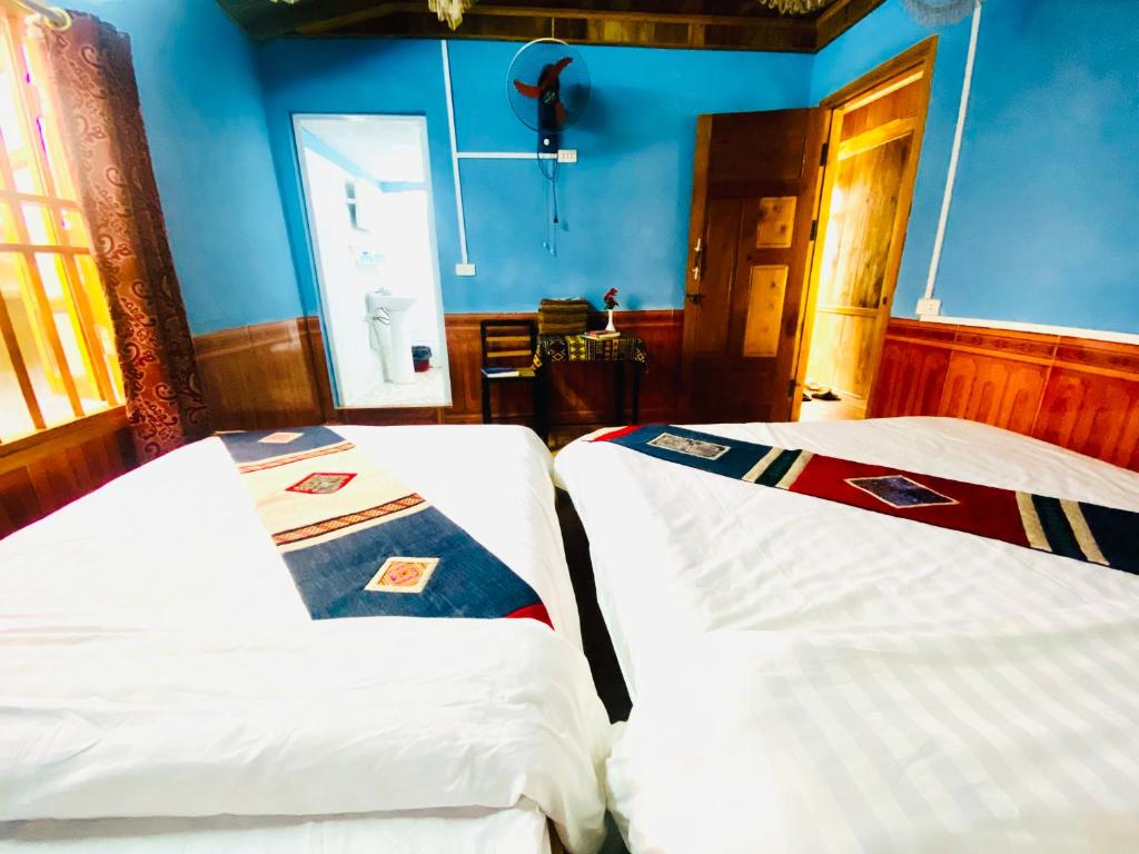Postel nebo postele na pokoji v ubytování Peace Home
