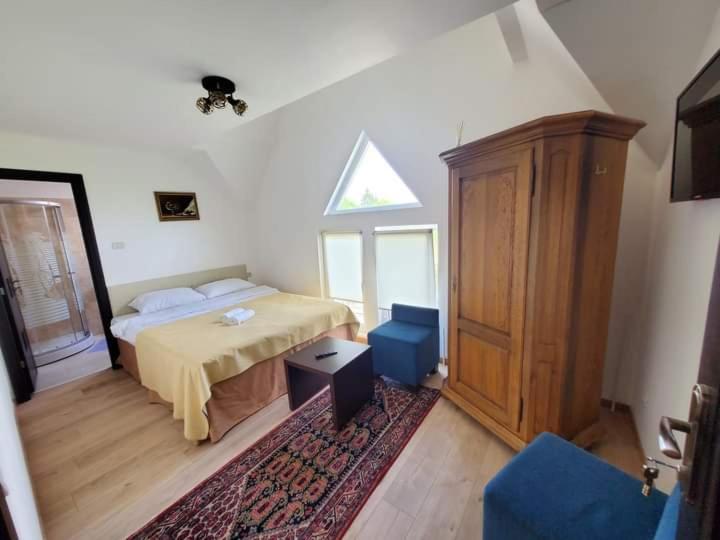 Postel nebo postele na pokoji v ubytování Dor de Han