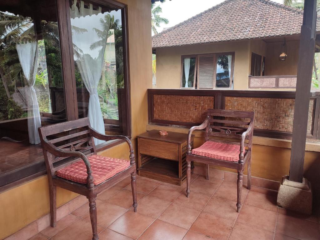 Balkón nebo terasa v ubytování Sari Wangi Cottage