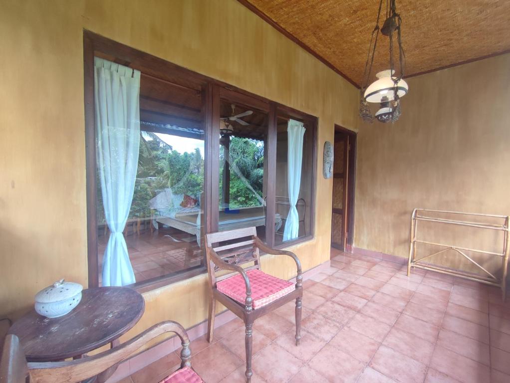 Posezení v ubytování Sari Wangi Cottage
