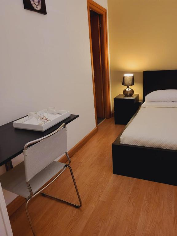 Postel nebo postele na pokoji v ubytování La Perla Di Noto