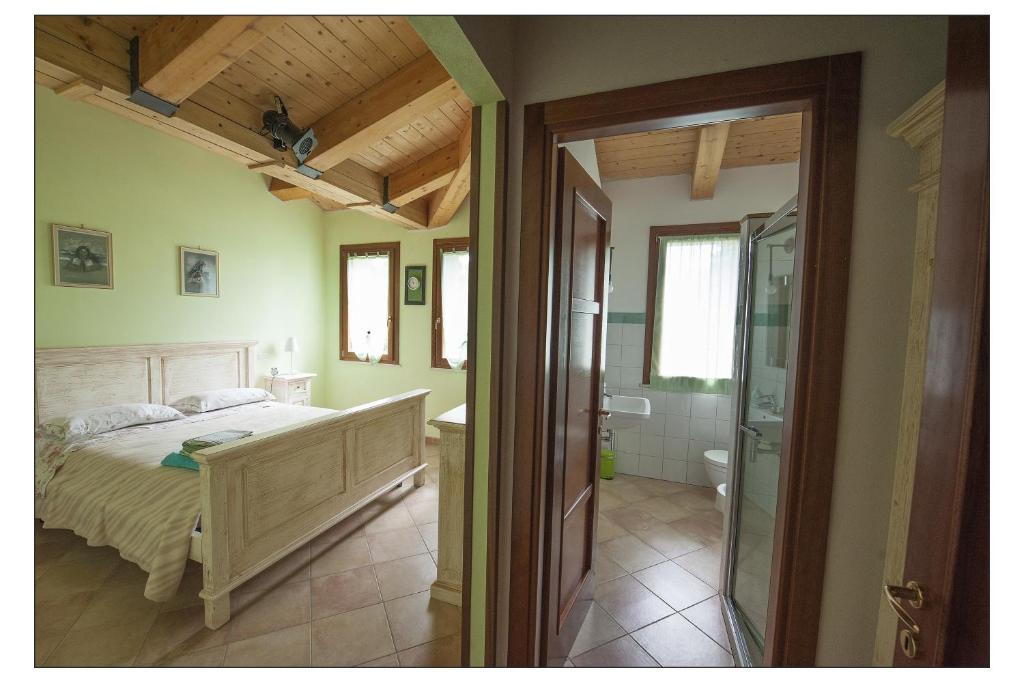 A bed or beds in a room at Bed & Breakfast Montesterlino