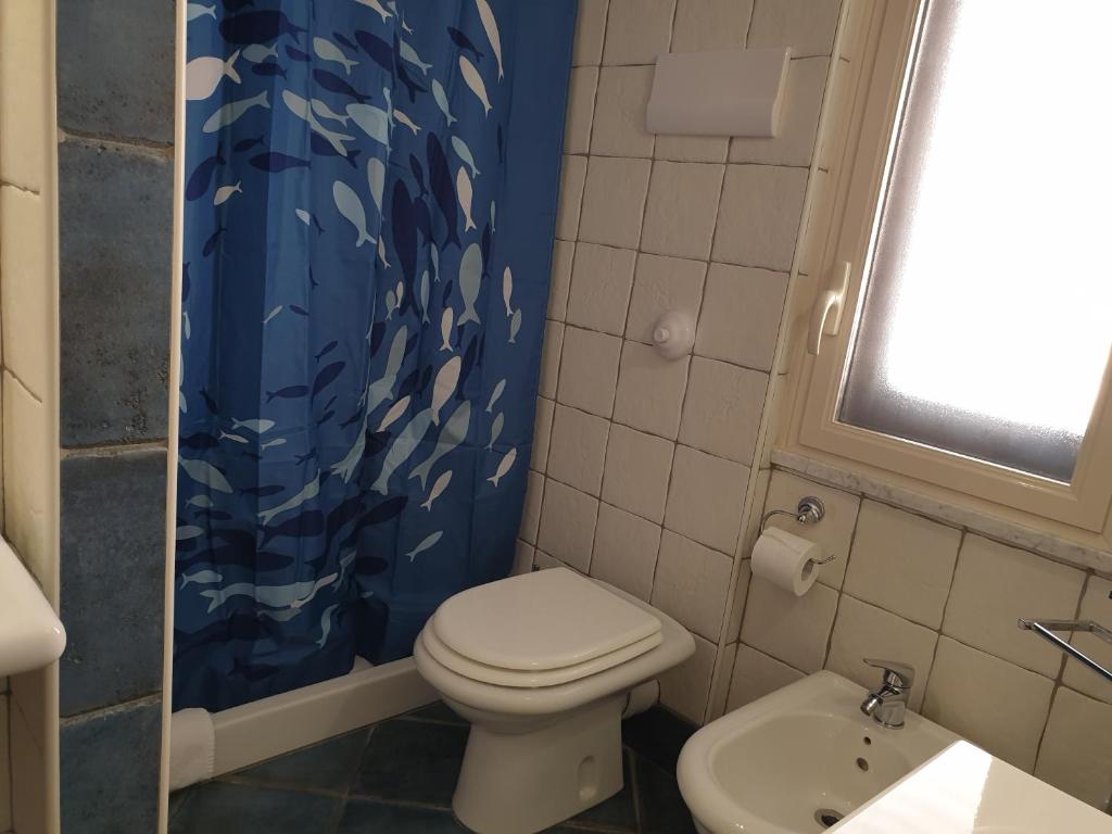 Kúpeľňa v ubytovaní Casa Maro'