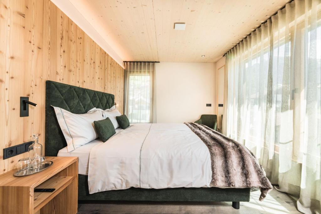 Postel nebo postele na pokoji v ubytování Amie Chalet