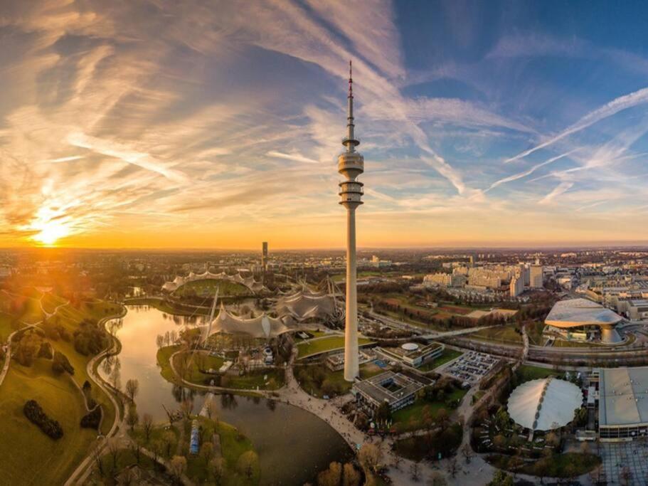 an aerial view of a city with a tower at City Appartement am Olympiapark in Munich