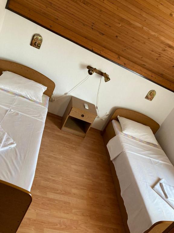 Postel nebo postele na pokoji v ubytování MIR