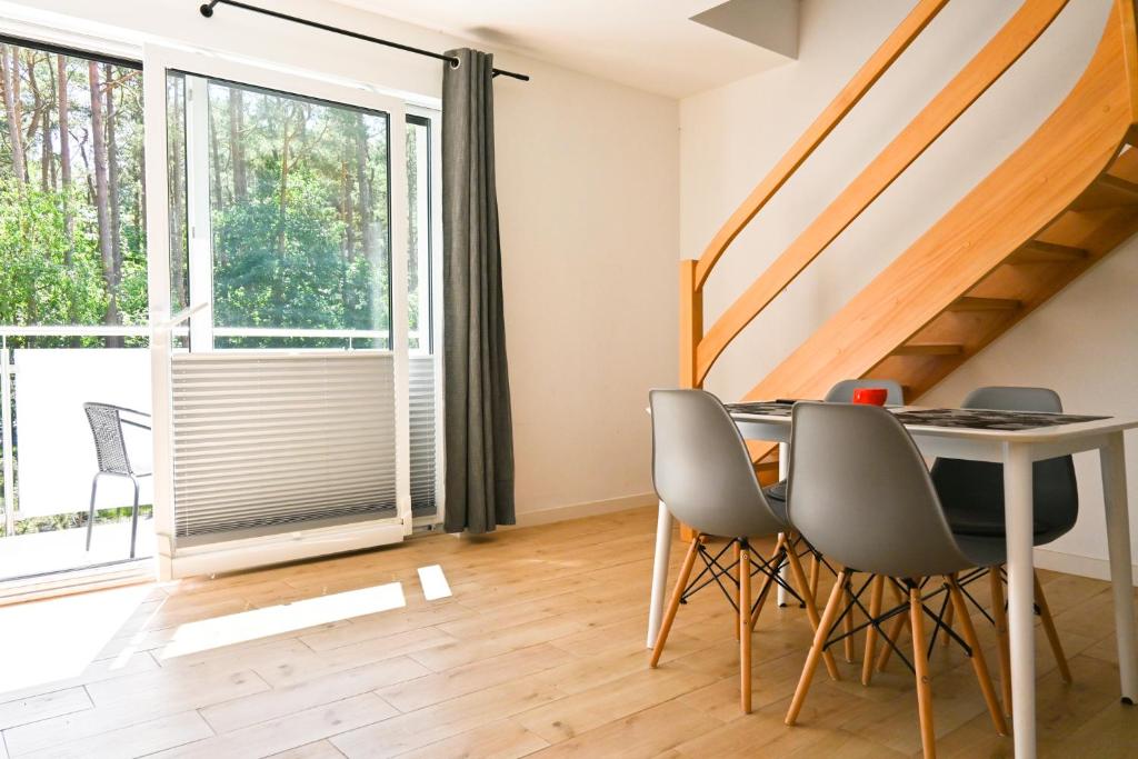 Balkon lub taras w obiekcie Komfortowy apartament dwupoziomowy w cichej okolicy