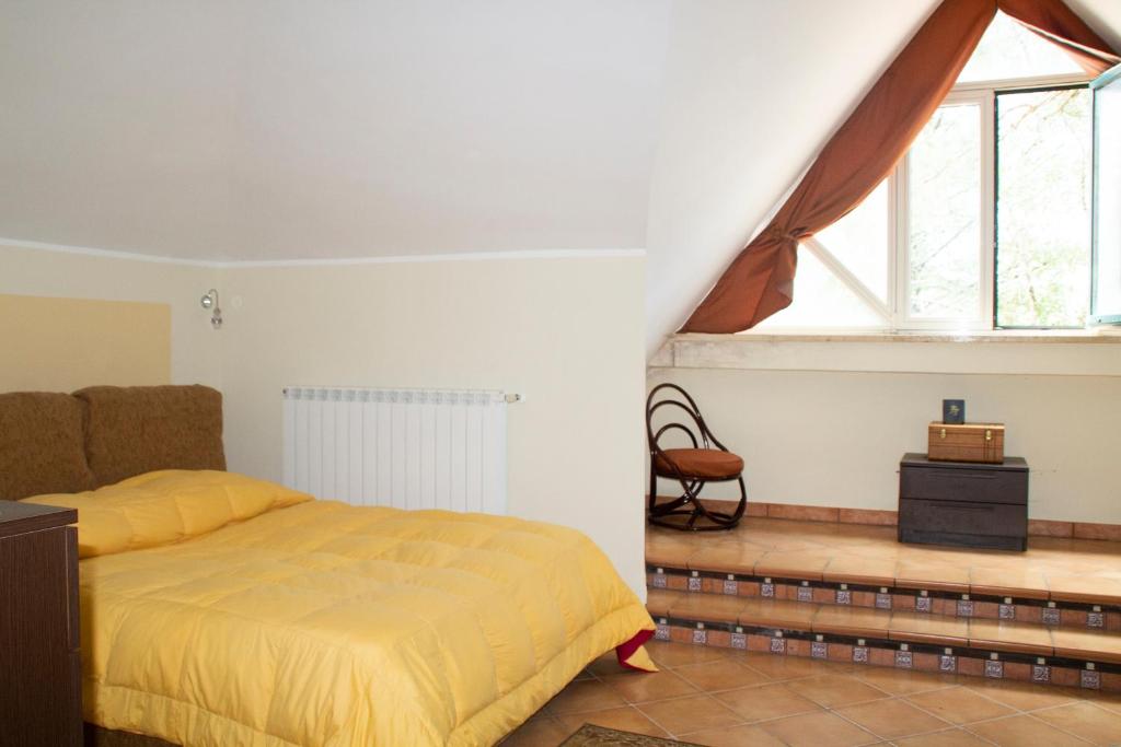 Łóżko lub łóżka w pokoju w obiekcie Casa Tronola