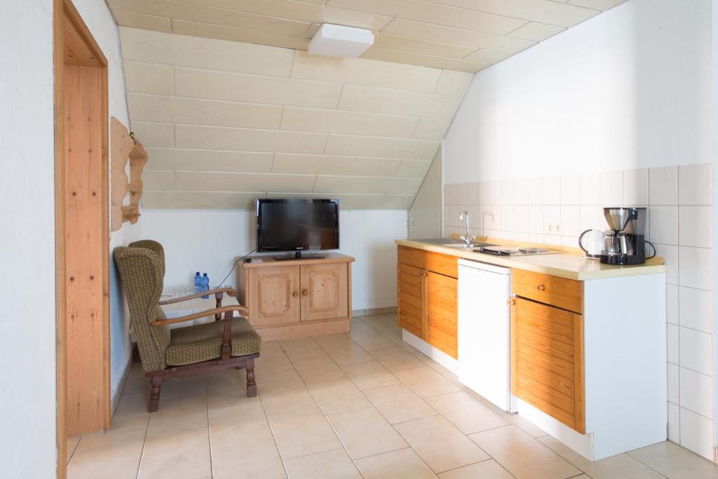 Kuchyň nebo kuchyňský kout v ubytování Landgasthof Bieg