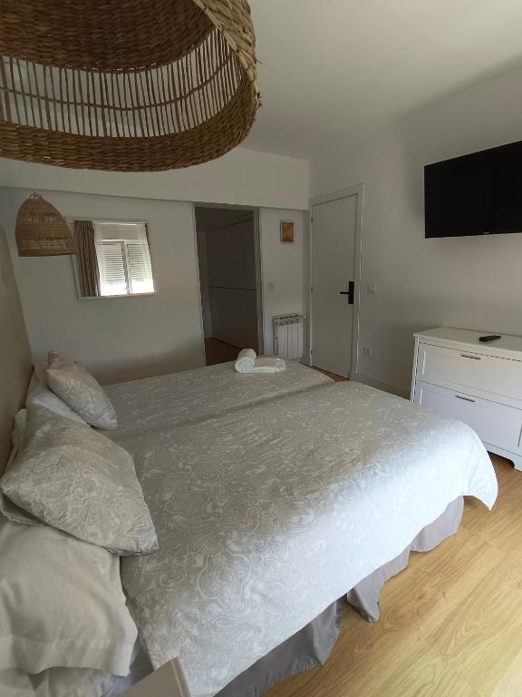 Posteľ alebo postele v izbe v ubytovaní Hotel Posada del Mar