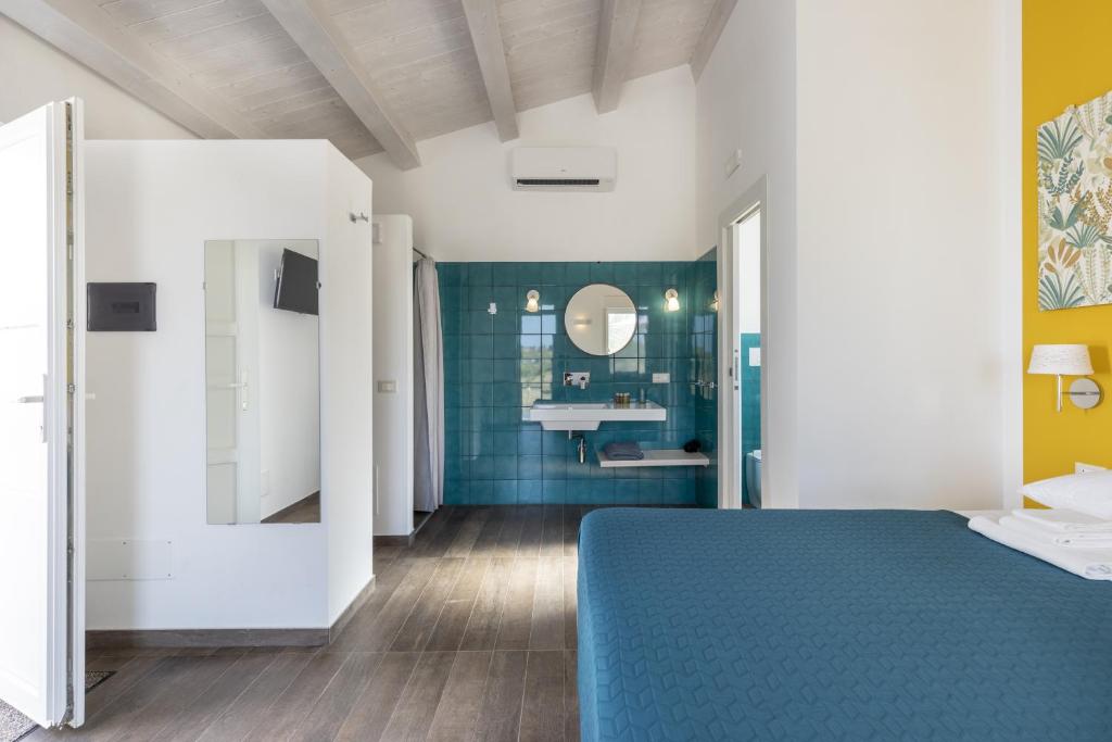 Postel nebo postele na pokoji v ubytování I Gelsomini Guest House