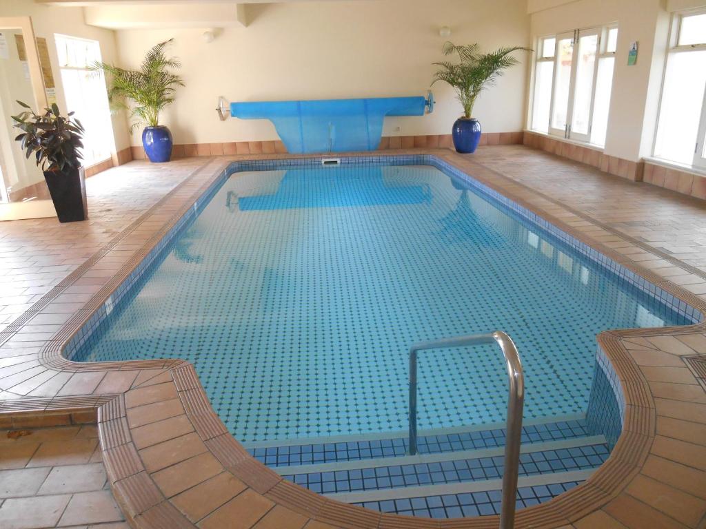 a large swimming pool in a building at St Francis Winery in Old Reynella