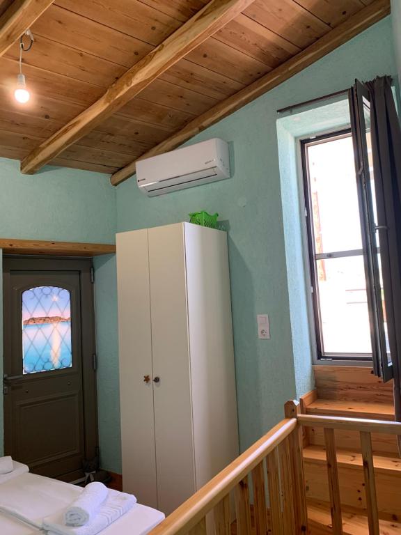 Postel nebo postele na pokoji v ubytování veranda